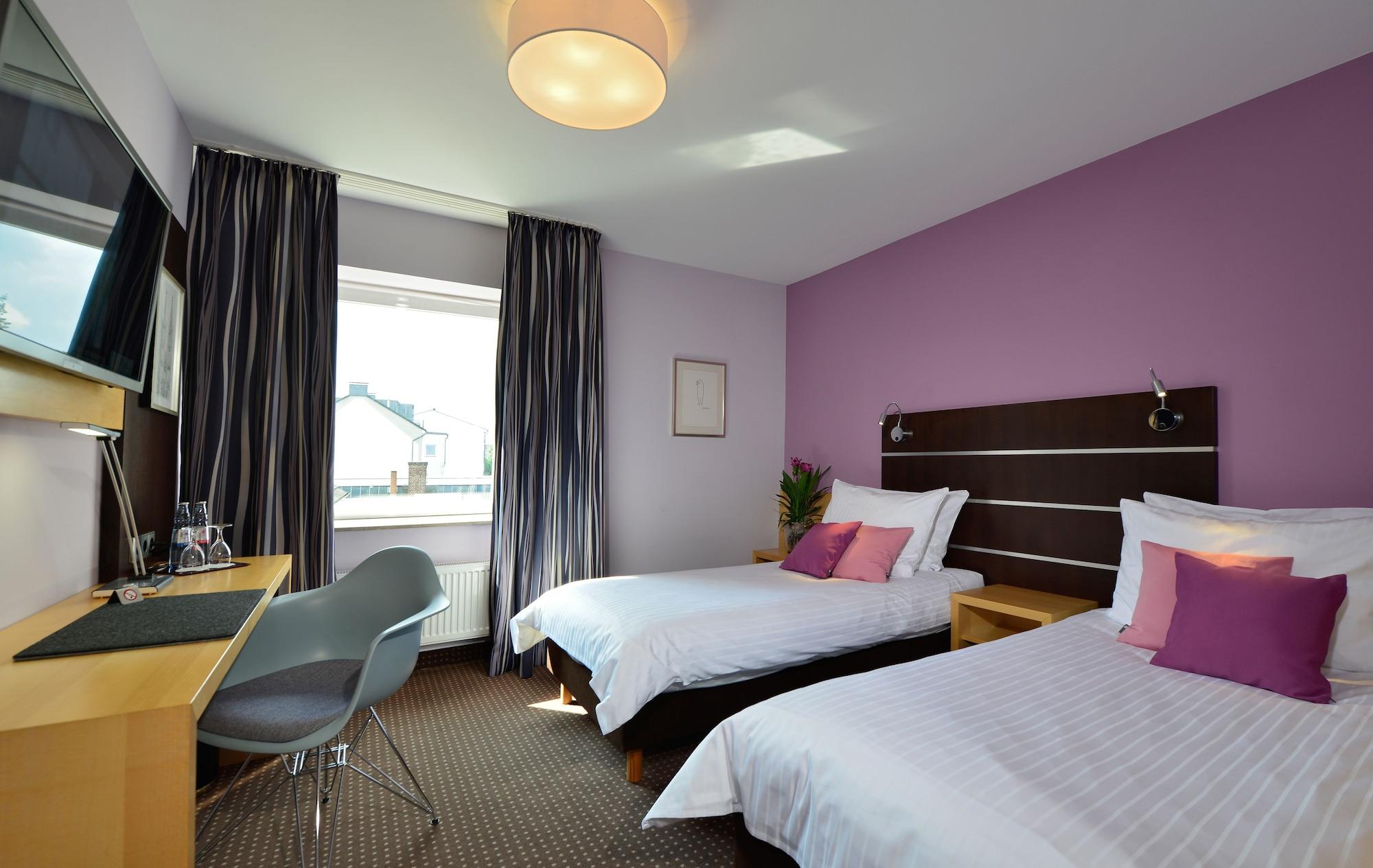 Hotel Uhu Garni Кьолн Екстериор снимка