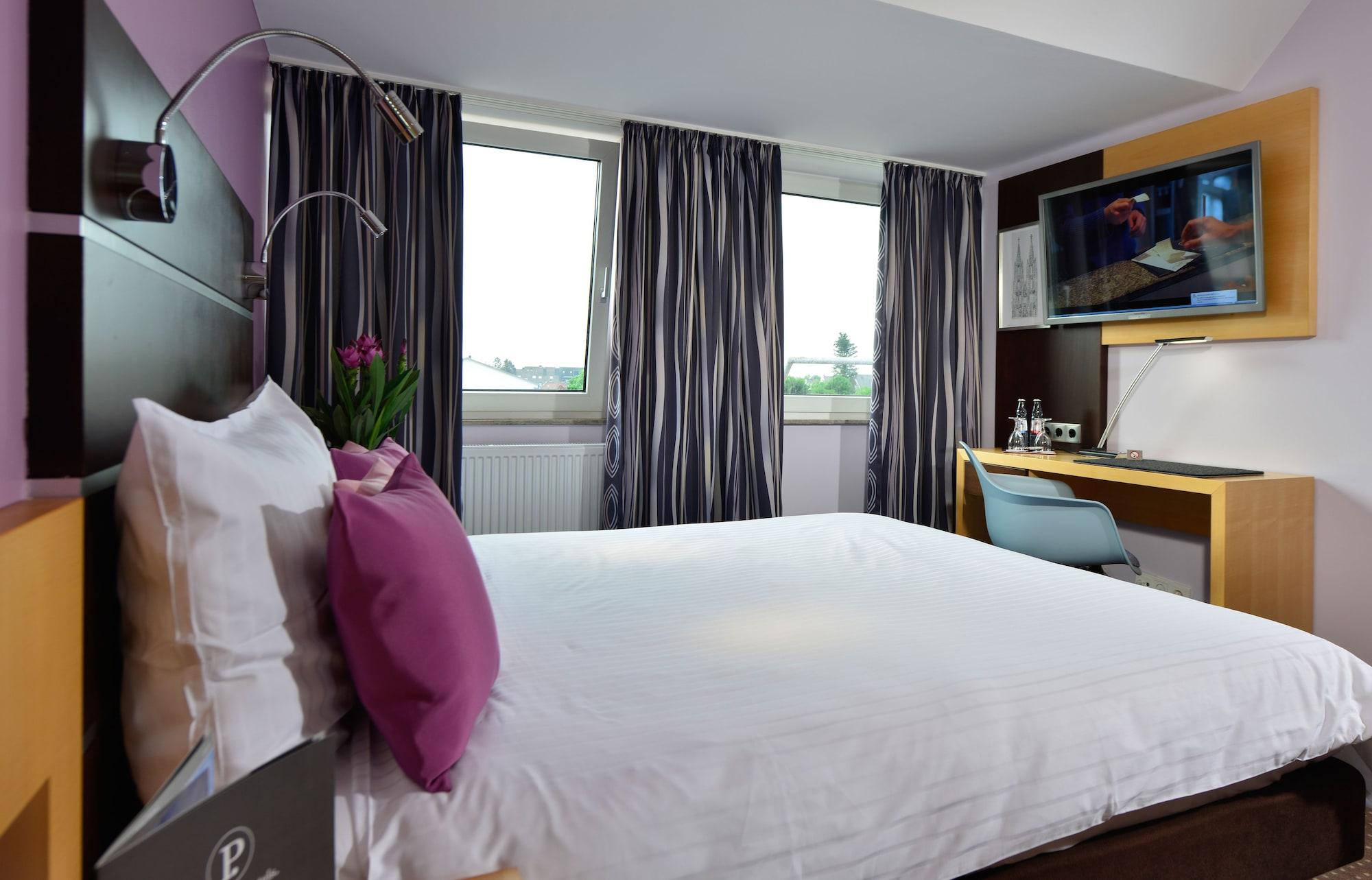 Hotel Uhu Garni Кьолн Екстериор снимка