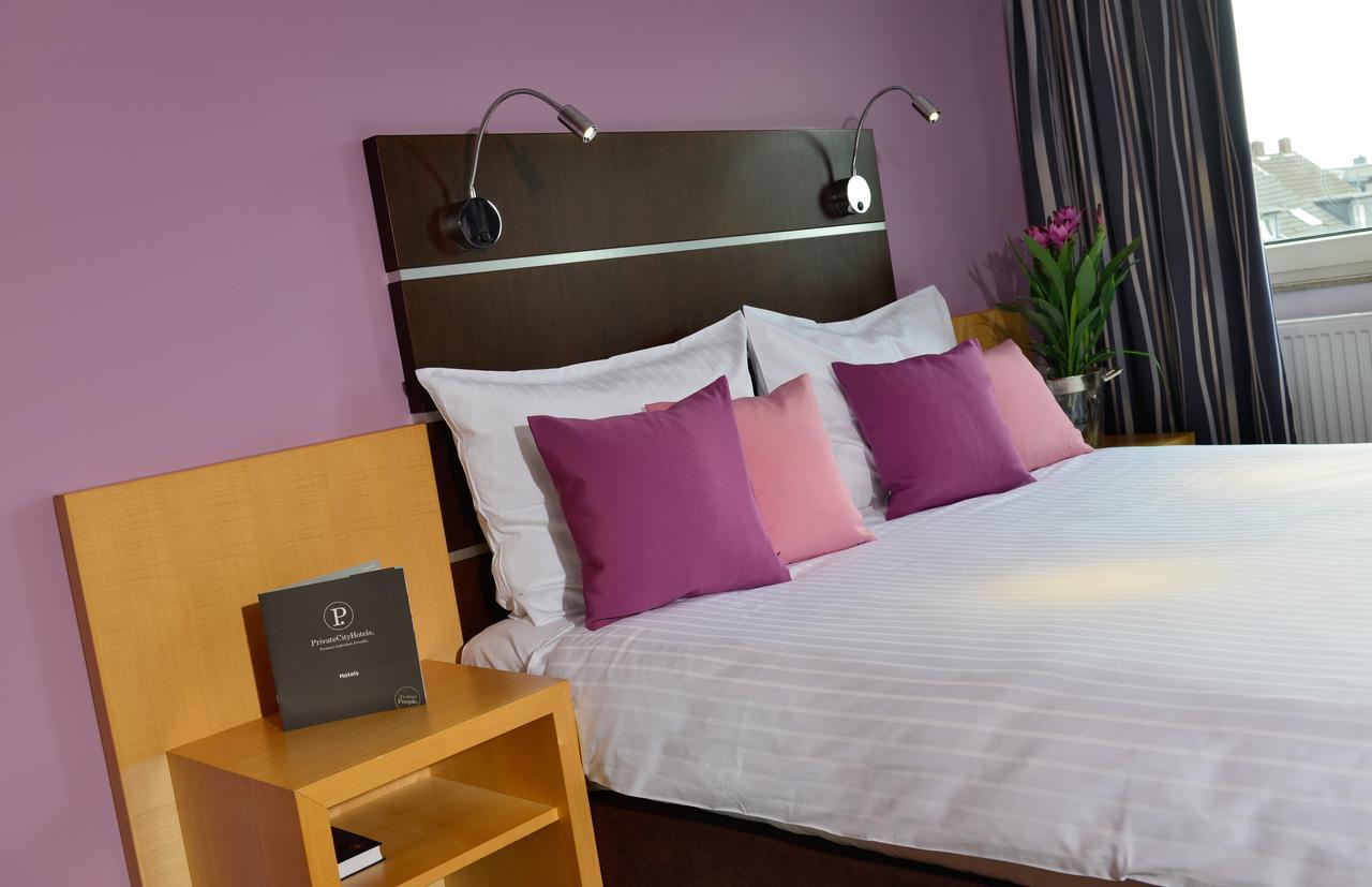 Hotel Uhu Garni Кьолн Екстериор снимка