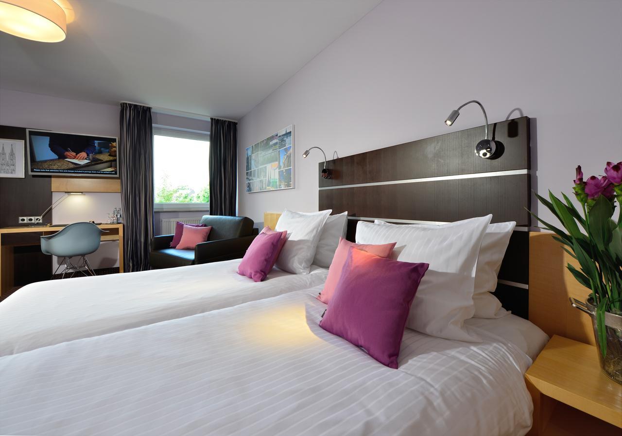 Hotel Uhu Garni Кьолн Екстериор снимка